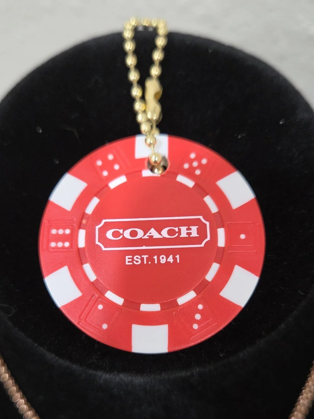 COACH Red and White Poker Chip Charm